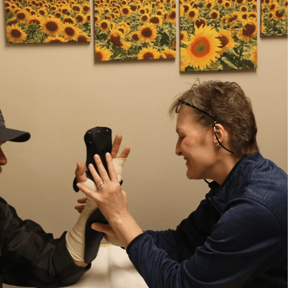 Licensed occupation therapist providing hand treatment at Canyon Therapy in Cody WY