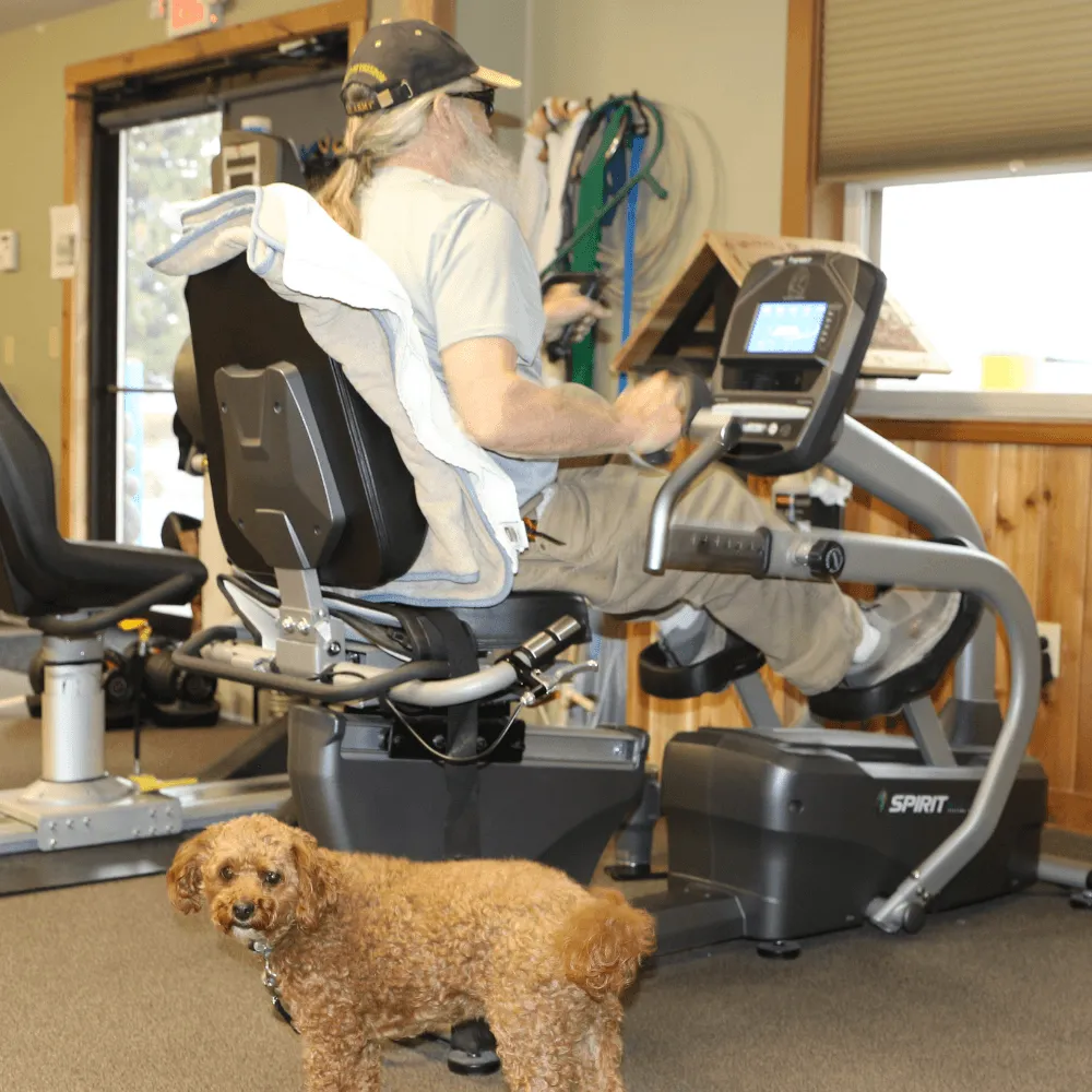 patient using a machine for neurological rehabilitation at canyon therapy Cody, WY