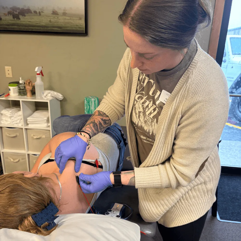 certified therapist preparing patient for dry needling at canyon therapy in cody wy