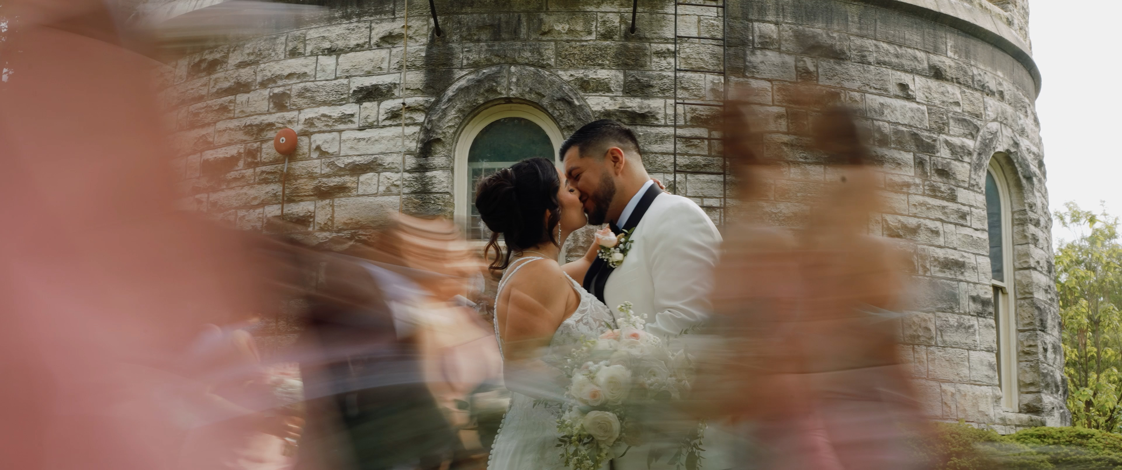 Salvador and Stephanie with the wedding party at Water tower Museum