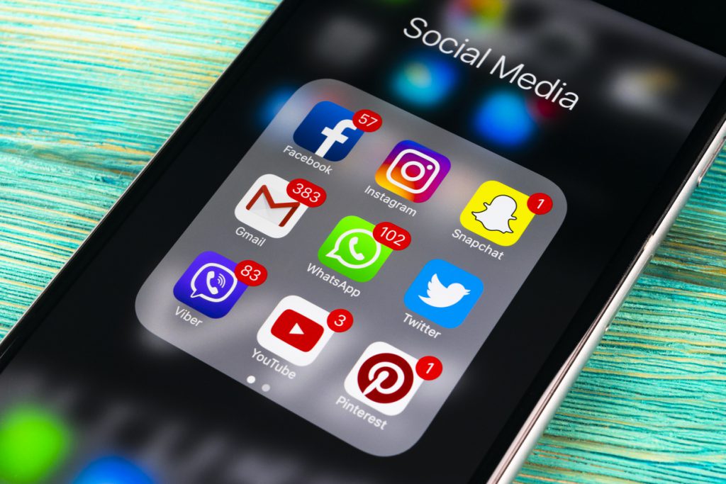 Smartphone home screen with social media and messaging apps