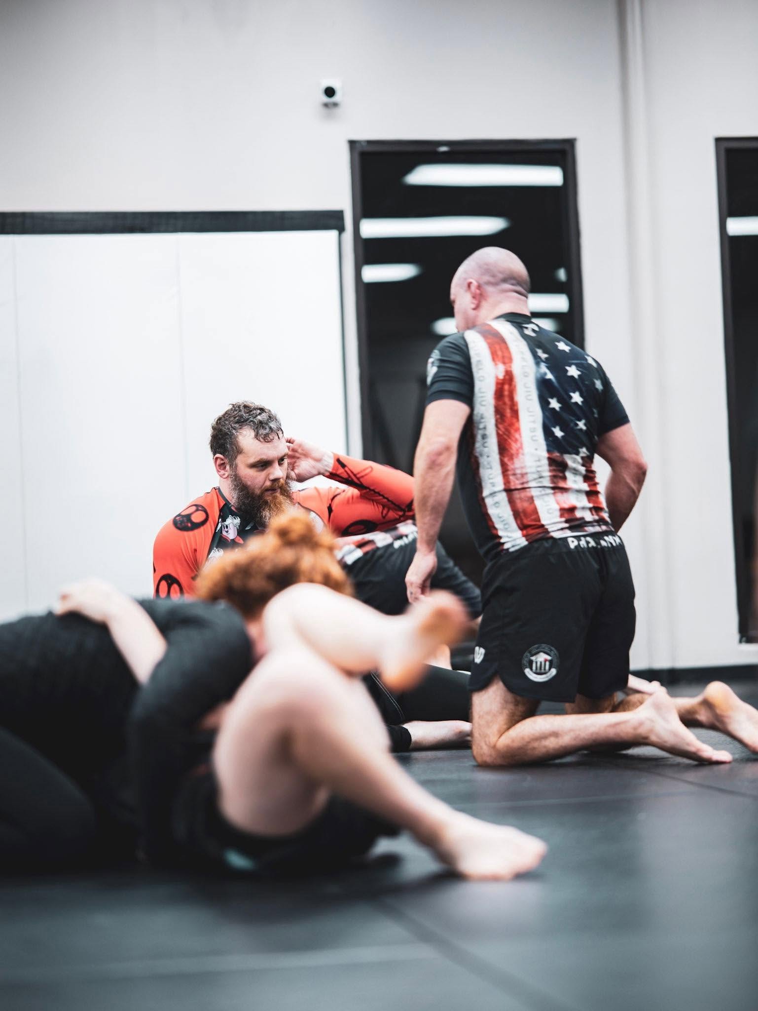 Brazilian Jiu Jitsu instruction during adult class in Tupelo