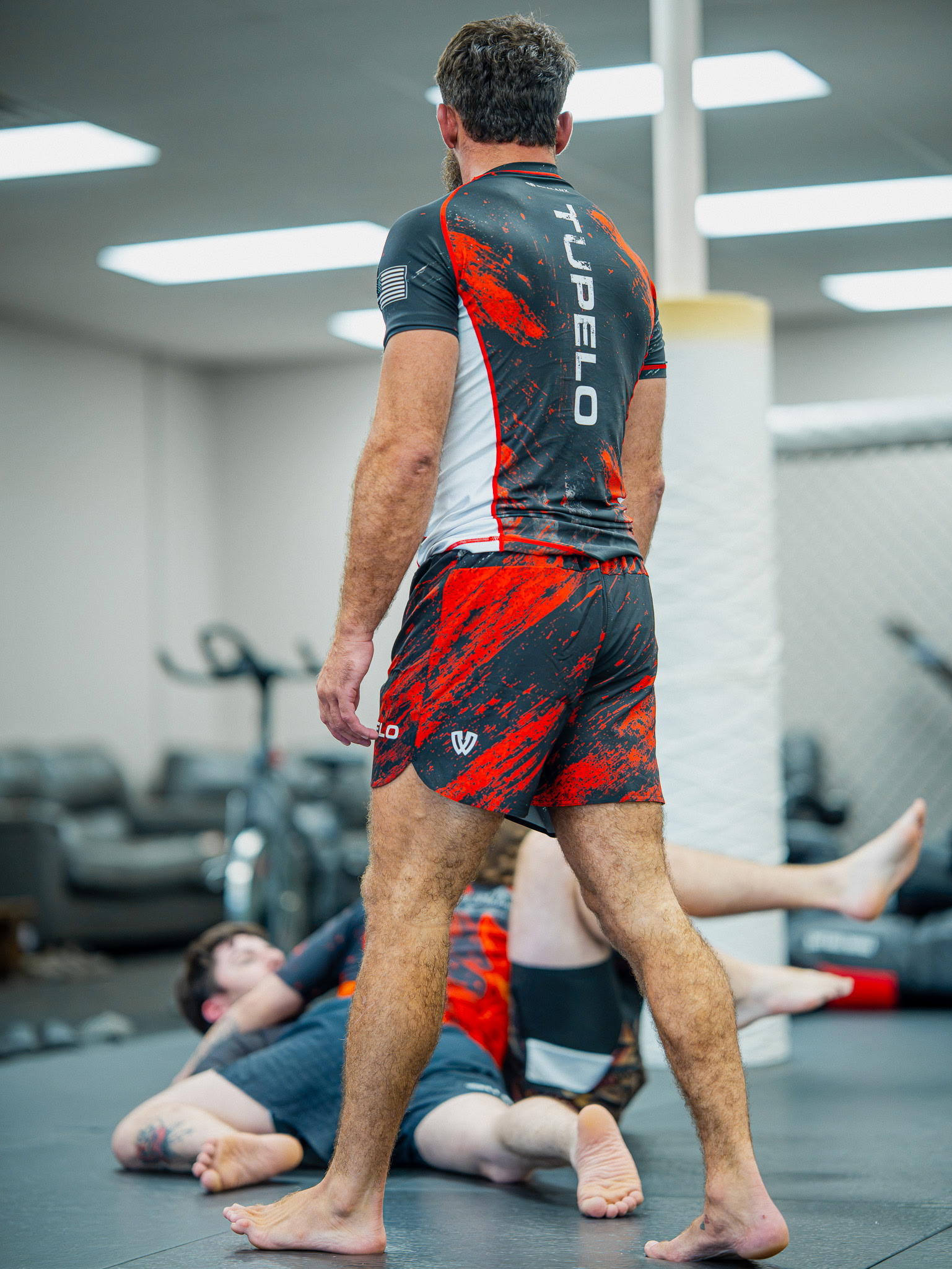 Brazilian Jiu Jitsu instructor coaching students during class at Tupelo Jiu Jitsu Academy