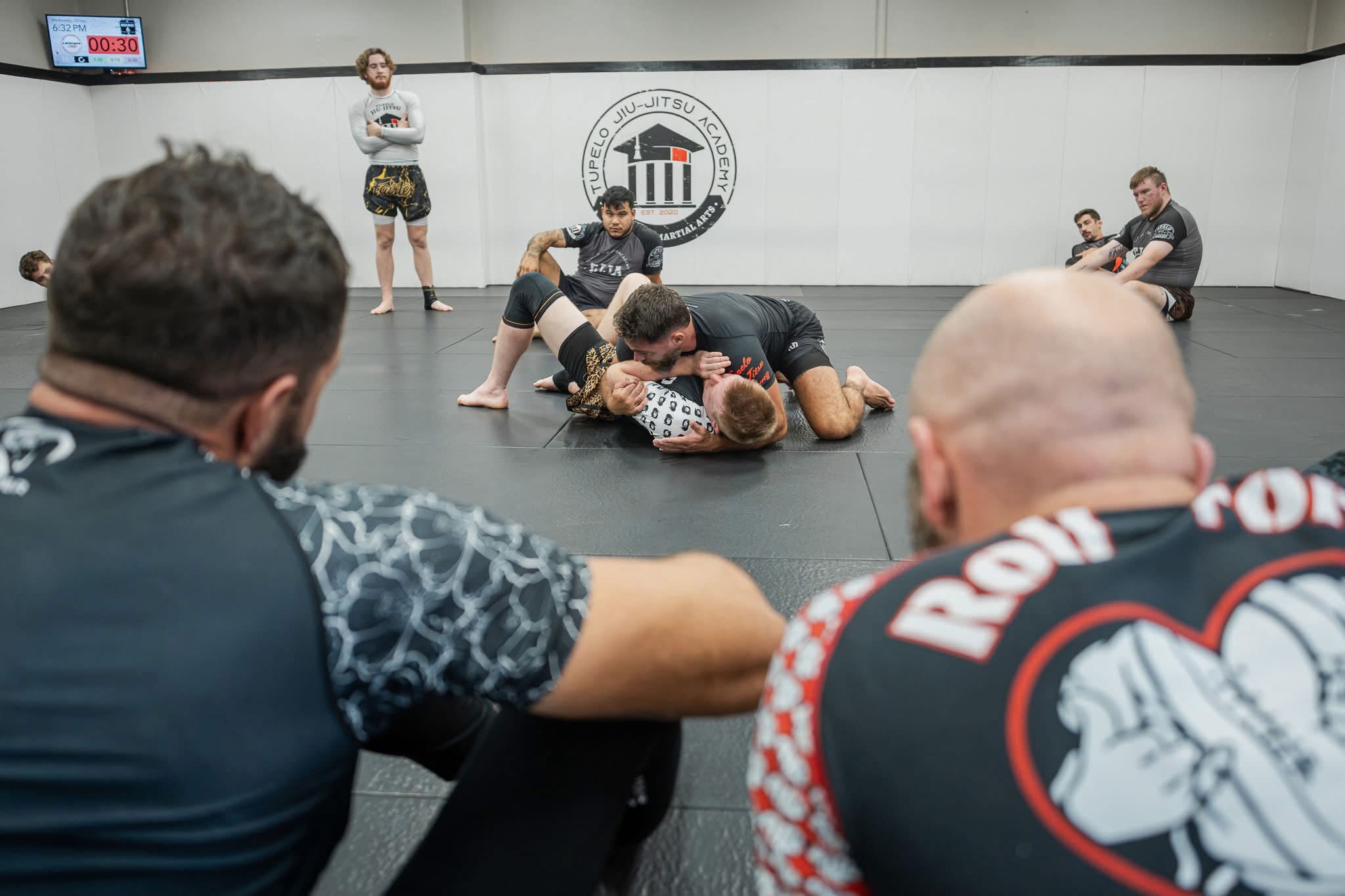 Brazilian Jiu Jitsu technique demonstration during class at Tupelo Jiu Jitsu Academy