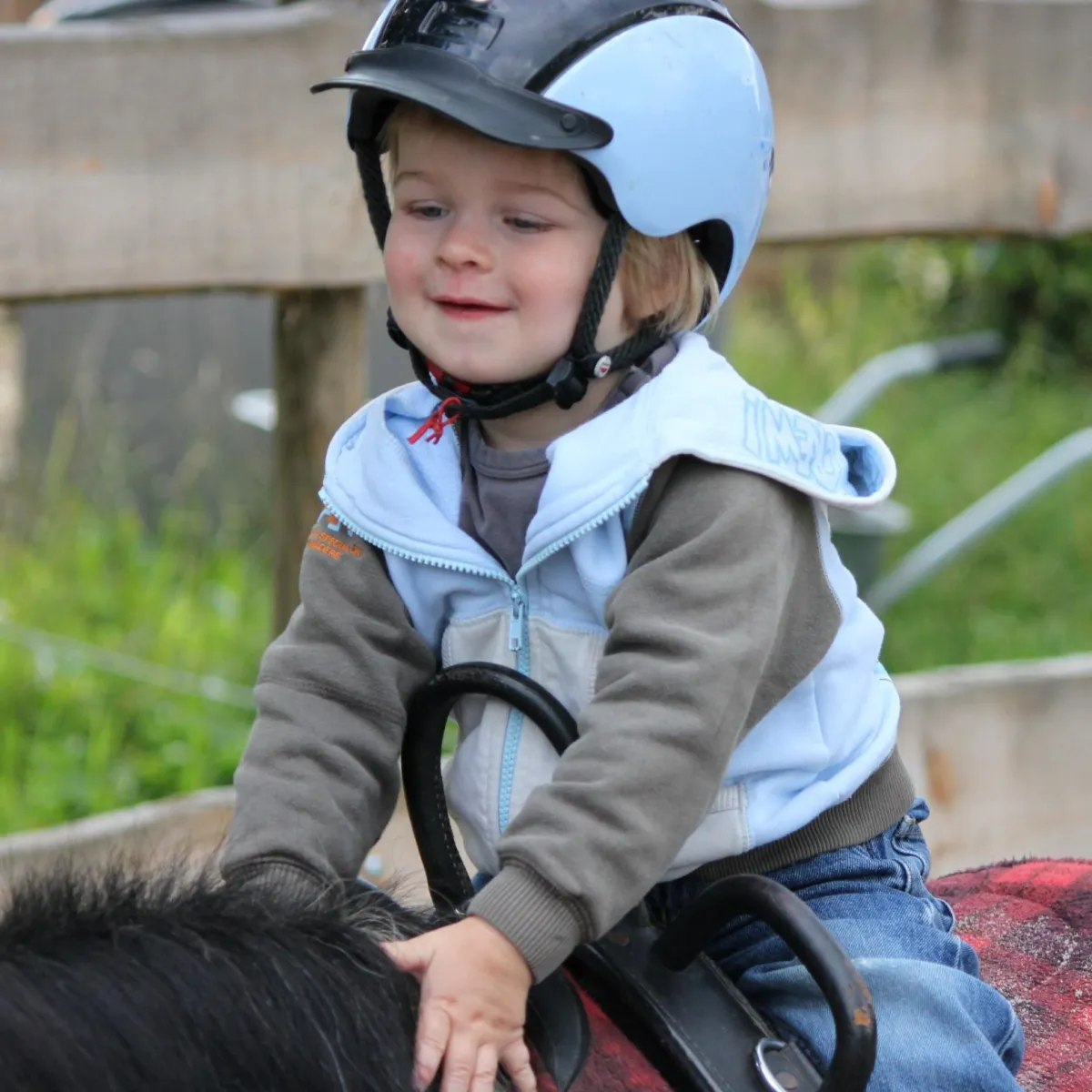 Riding in the rain at camp 