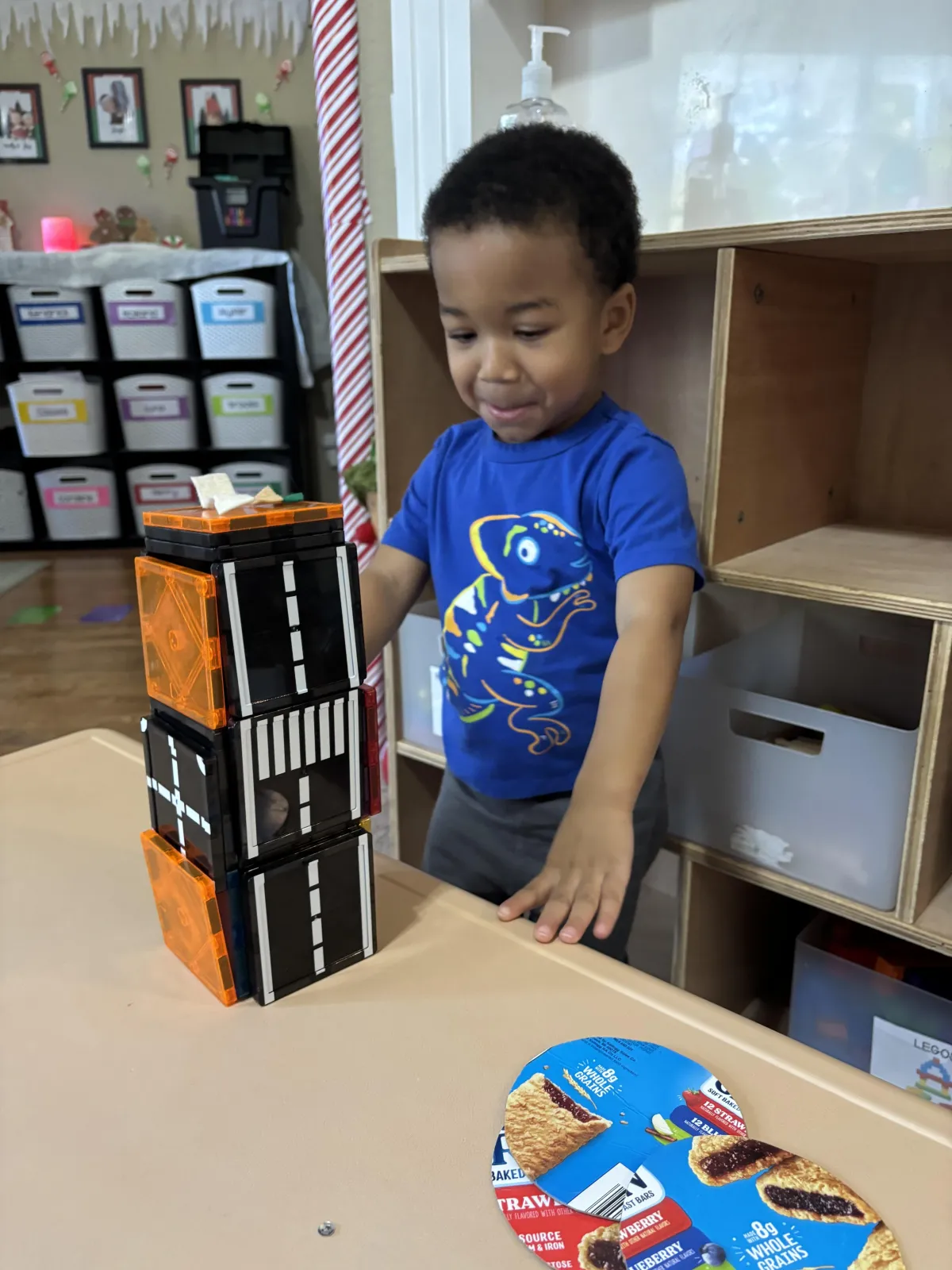 Girl watches a lesson about the alphabet on a laptop