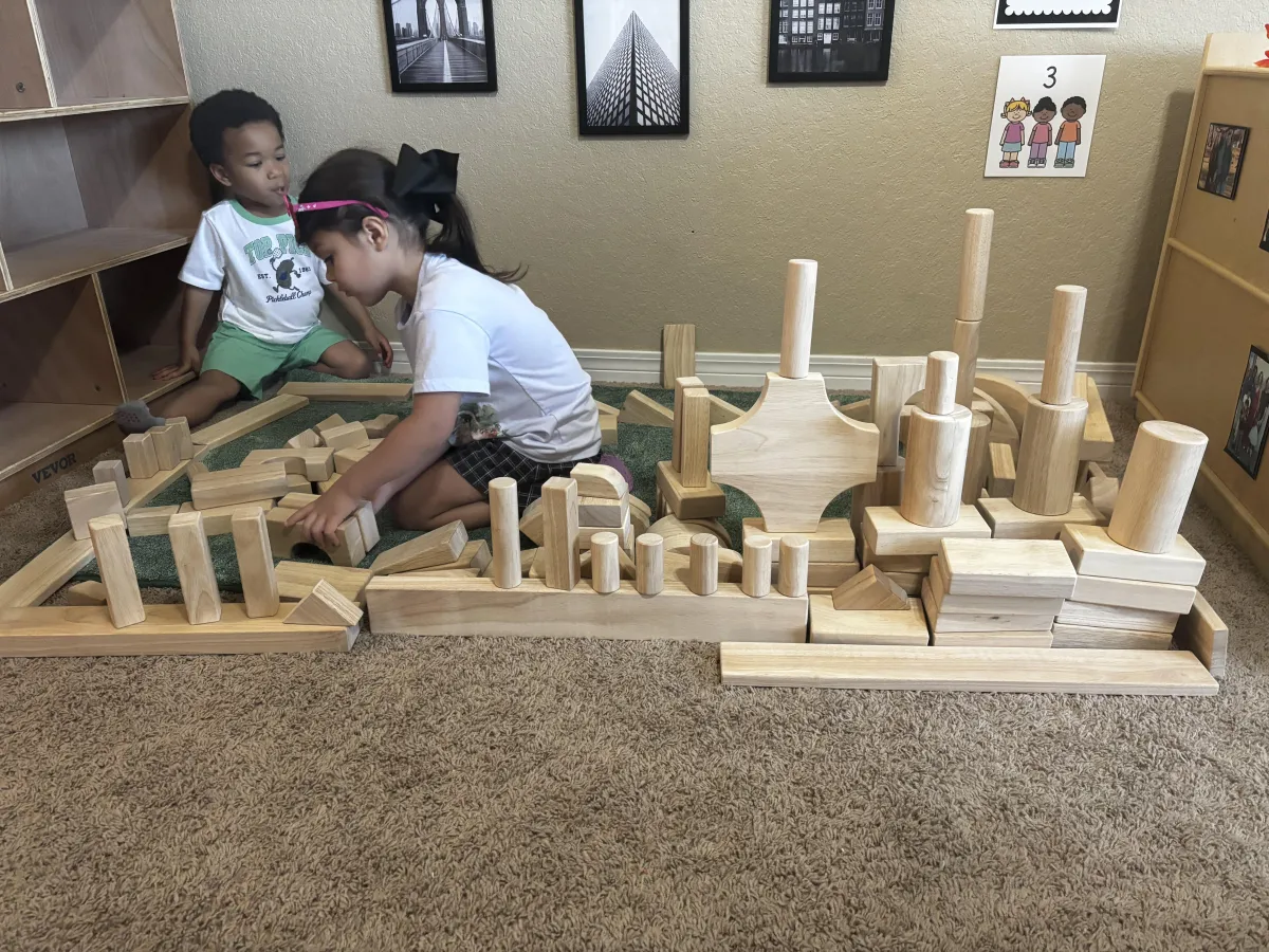 Girl watches a lesson about the alphabet on a laptop