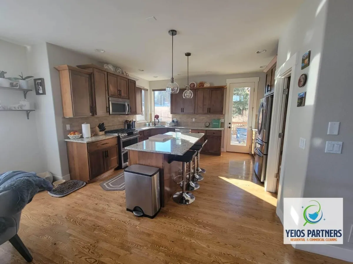 Freshly mopped hardwood floors and wiped surfaces in a Boulder family home.