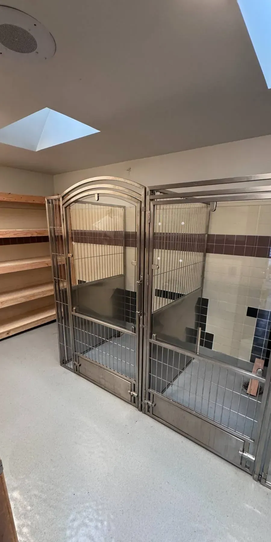 Completed Kennels and Shelves Install by Seattle carpentry and home repair specialists {{custom_values.business_name}