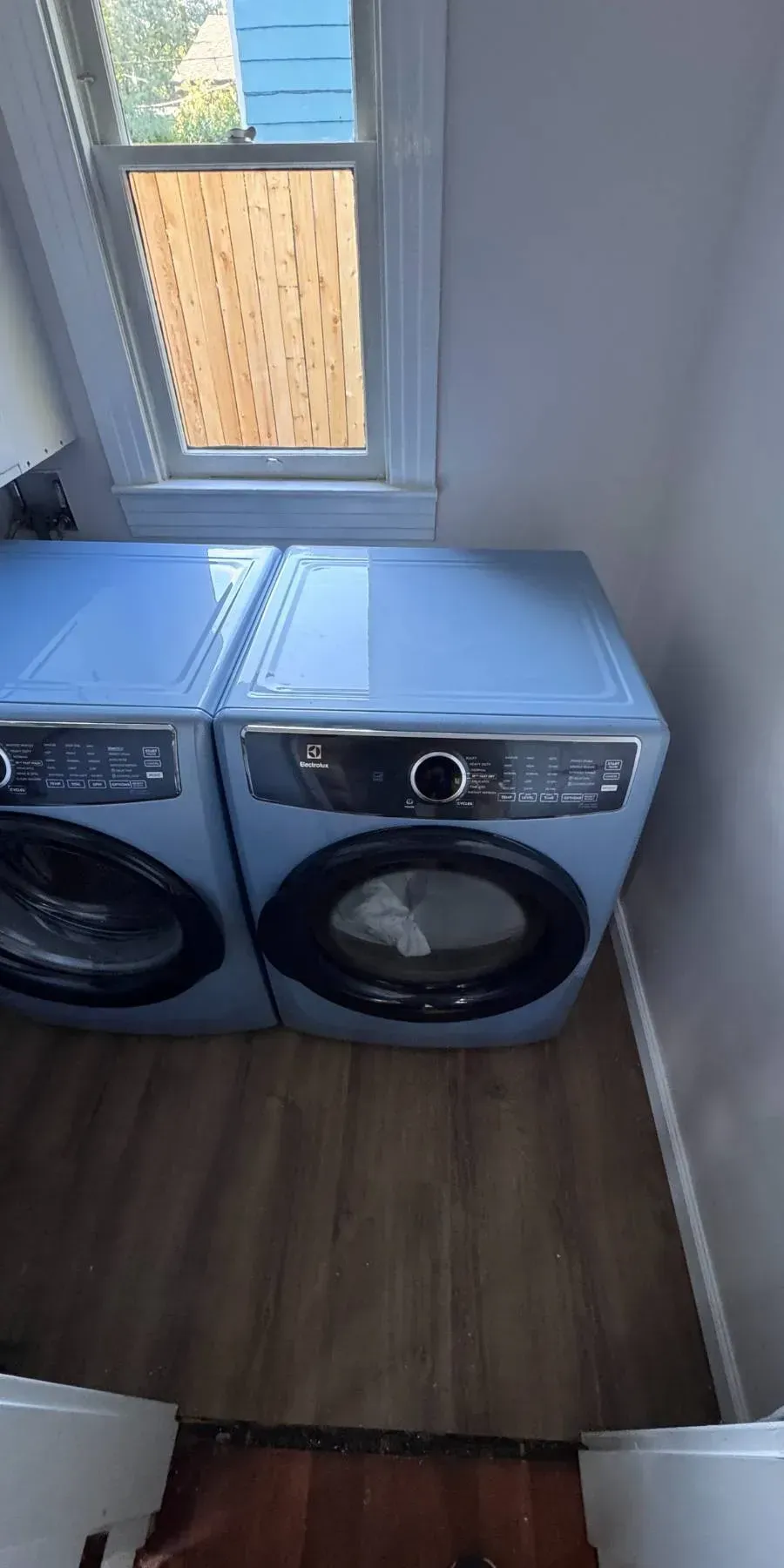 Completed Laundry Room Install by Seattle carpentry and home repair specialists {{custom_values.business_name}
