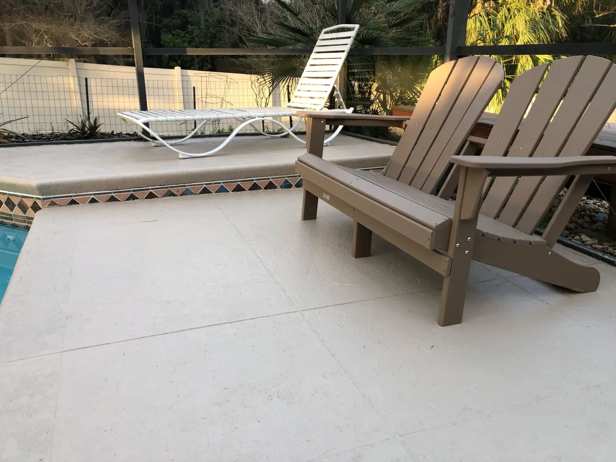 Resurfaced pool deck with bench