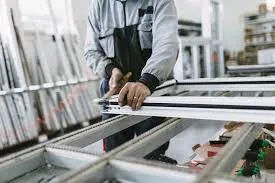black framed sunglasses on white table