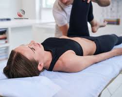 Woman uses vr headset for body scan with technician