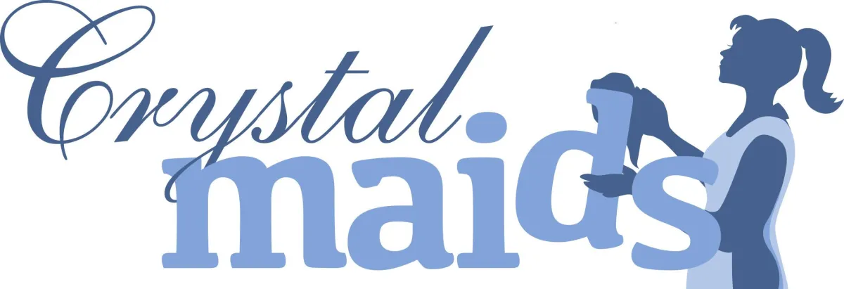 Official logo for Crystal Maids featuring a stylized silhouette of a cleaning professional holding a spray bottle, integrated with the company name in blue serif and sans-serif typography.
