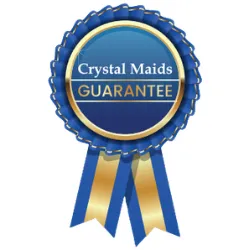 Blue and gold award ribbon seal featuring the text "Crystal Maids GUARANTEE," representing our 100% satisfaction commitment