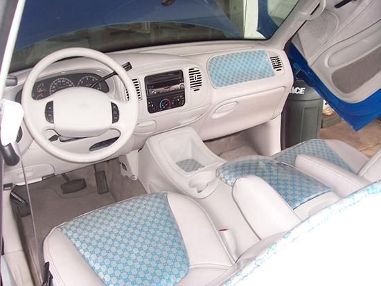 High quality auto upholstery of a white card one by A&E Auto in Melbourne Florida