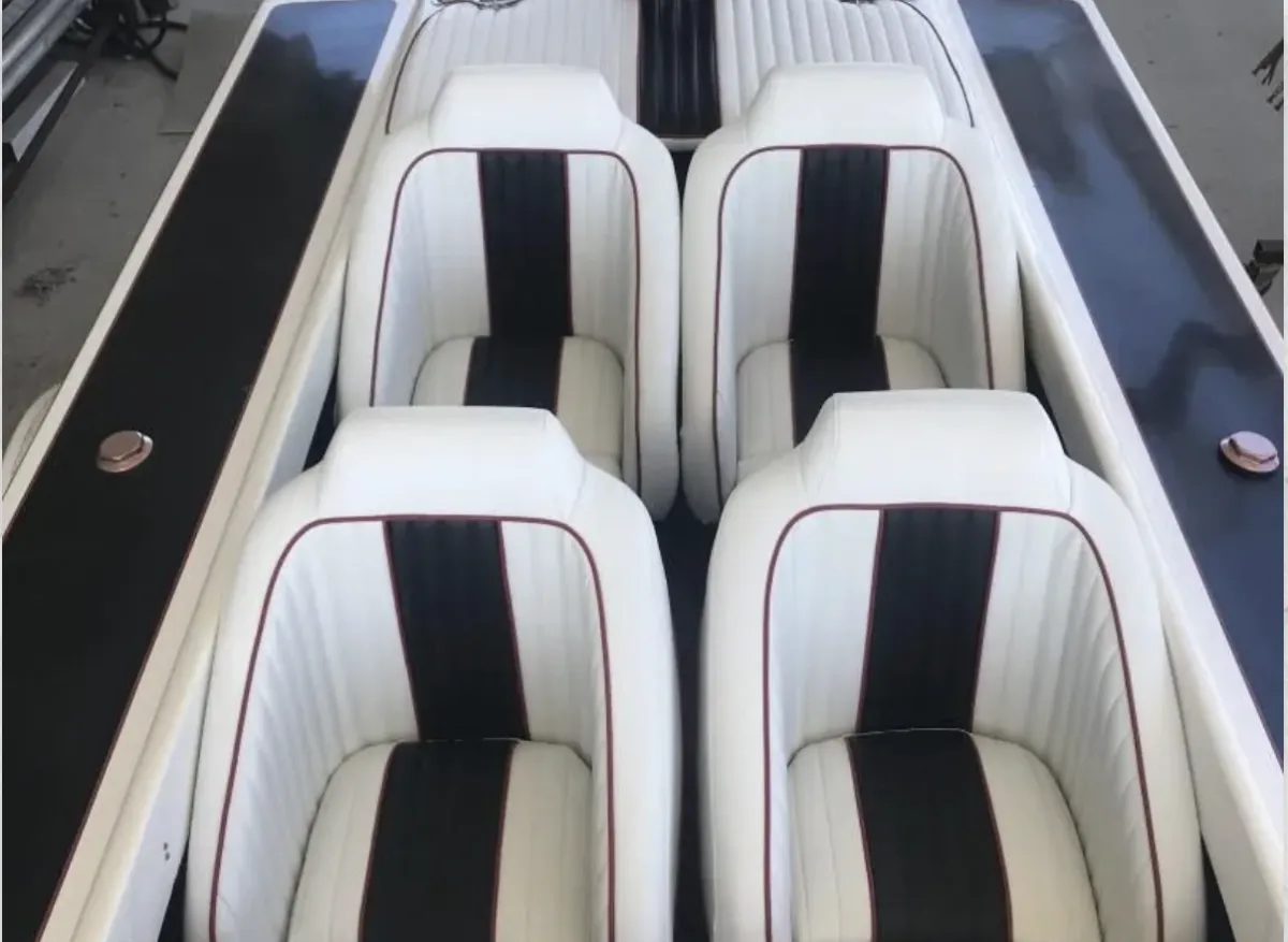 Red and white boat set upholstery done by a&e auto upholstery