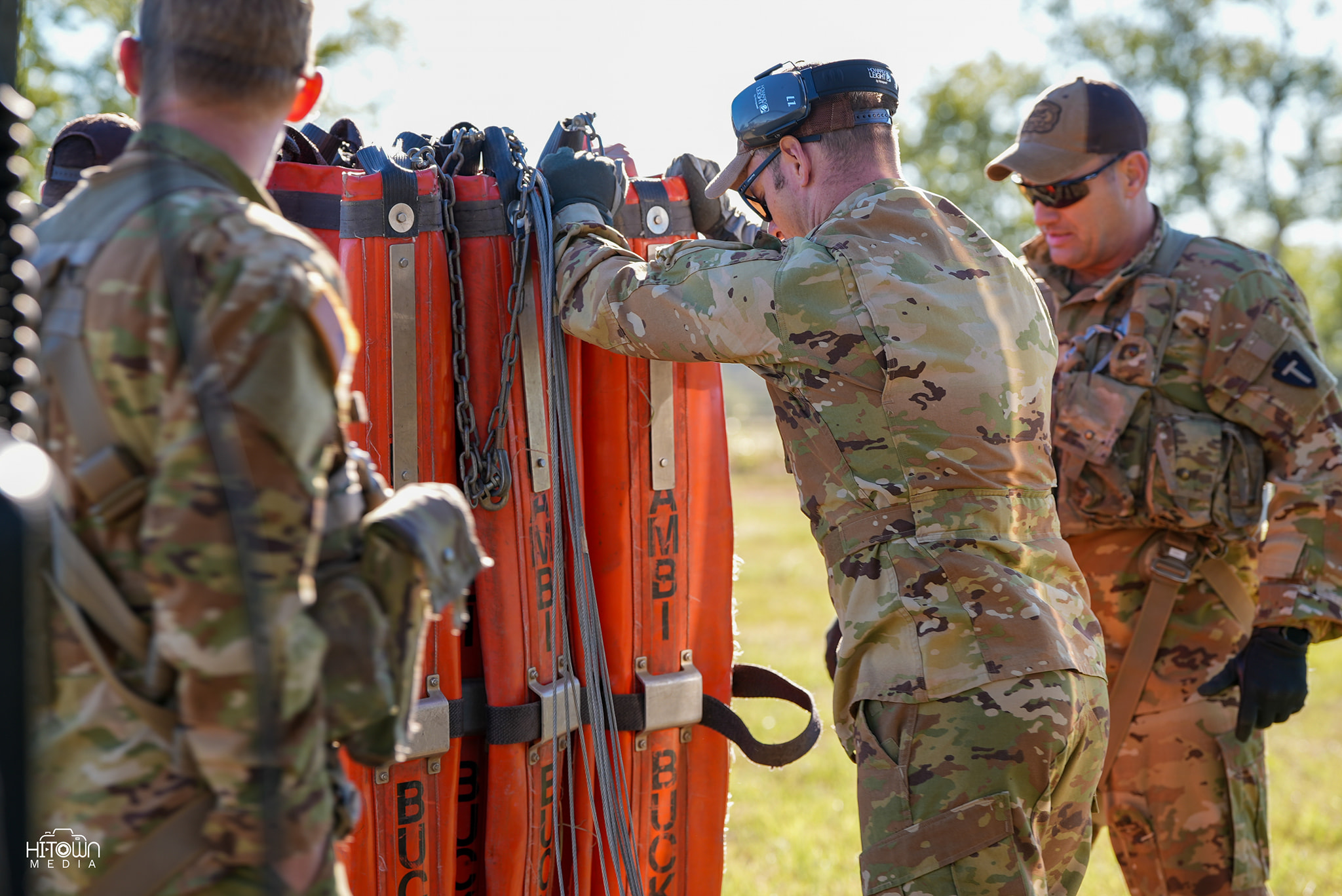 man holding incandescent bulb