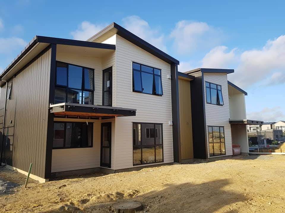 newly built modern home exterior painting and plastering Auckland