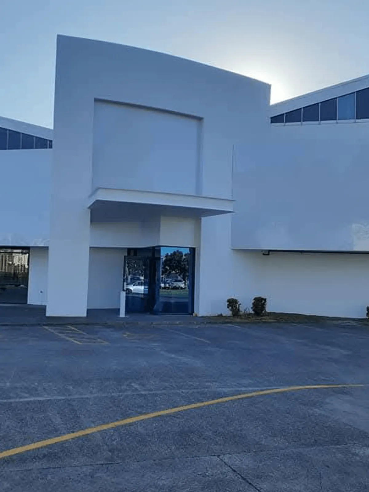 exterior commercial building painting Auckland professional finish