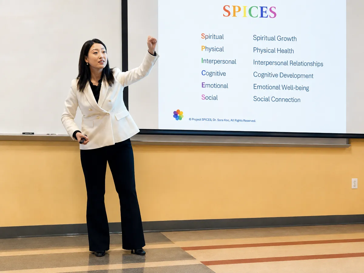 Dr. Sarai Koo teaching the six Project SPICES domains: Spiritual, Physical, Interpersonal, Cognitive, Emotional, and Social