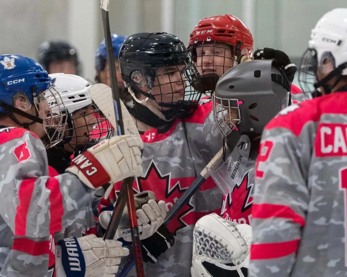 Minimalist studio portraits with orange backdrop