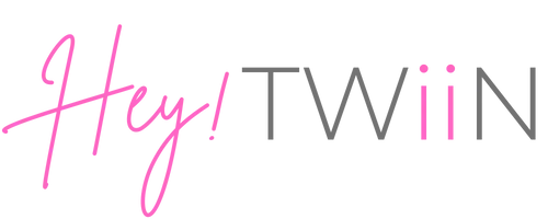 A vibrant, futuristic workspace with a diverse group of creators and entrepreneurs gathered around a holographic screen displaying AI-generated video content.