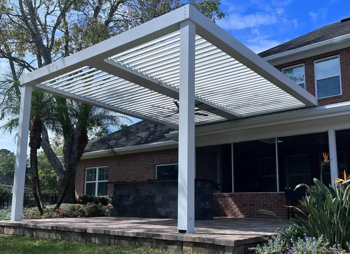 StruXure pergola with partially open motorized louvers blue sky St. Johns County Florida