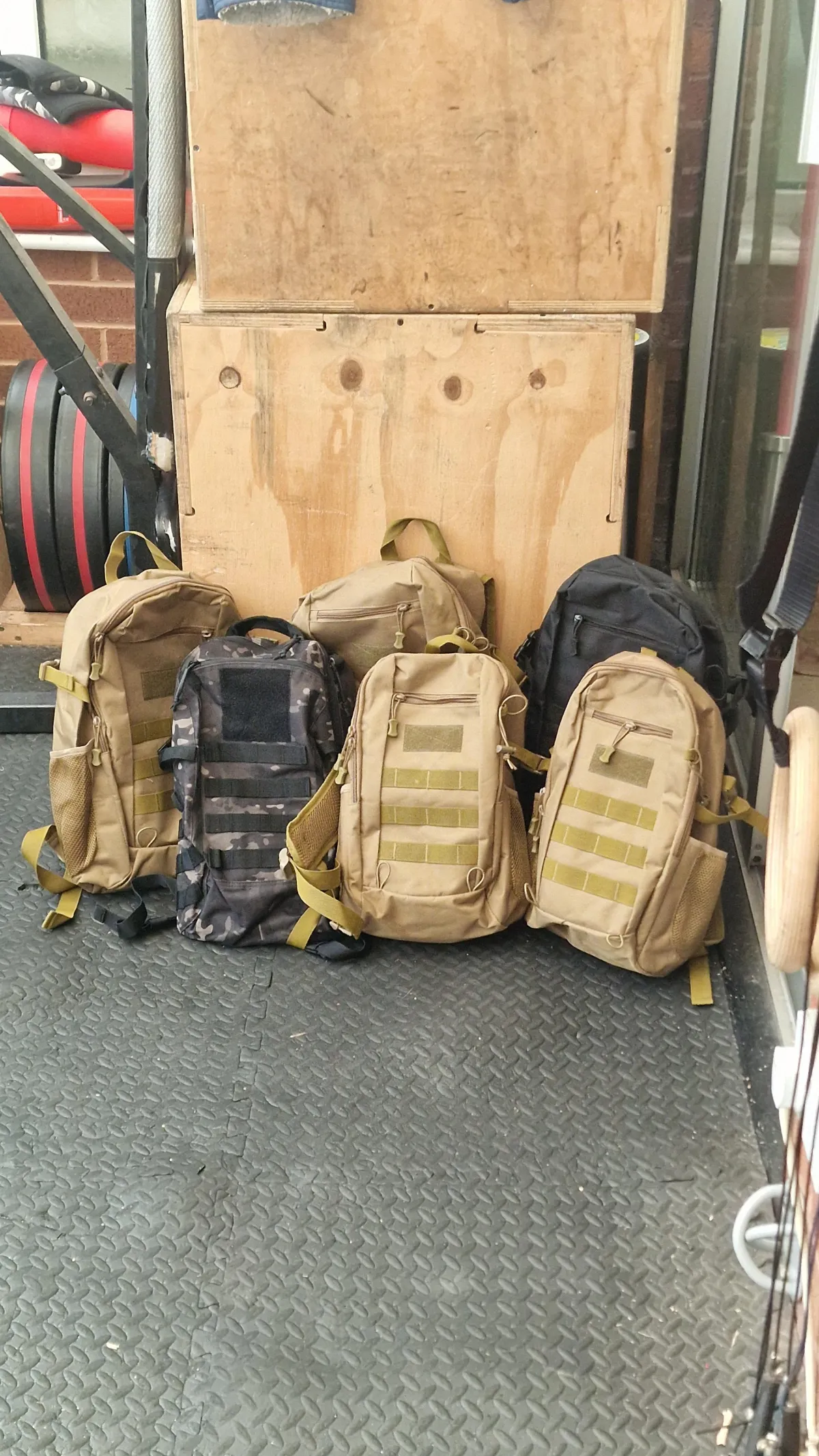 A beginner carrying a lighter 2kg ruck alongside others