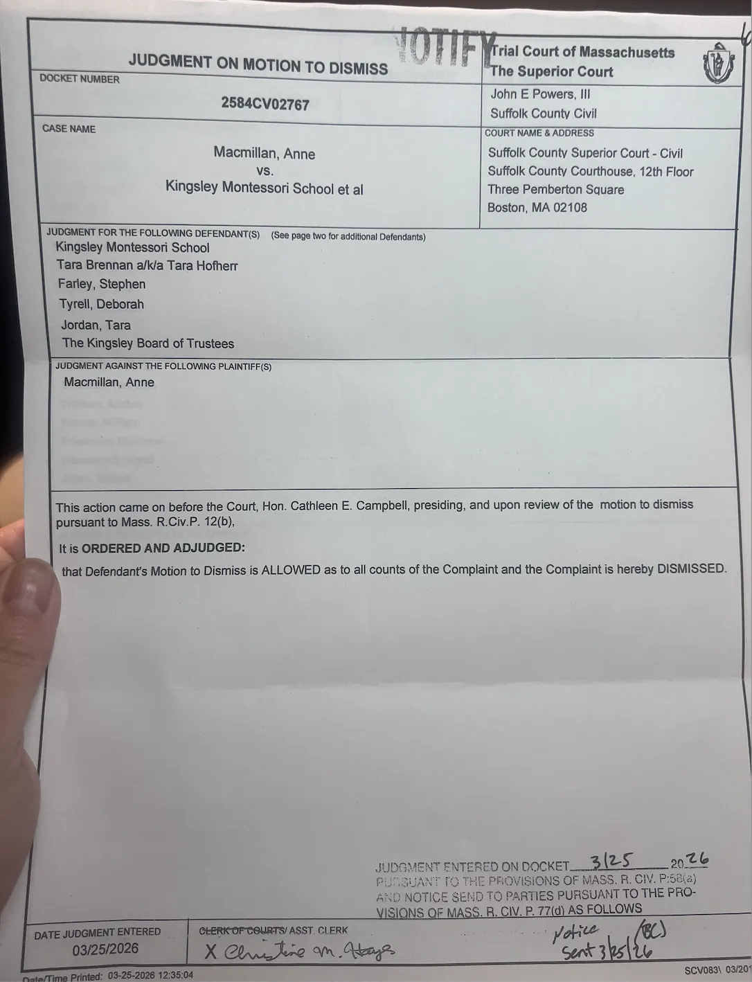 Photograph of the court’s Judgment on Motion to Dismiss in MacMillan v. Kingsley Montessori School, showing the first page of the signed ruling.
