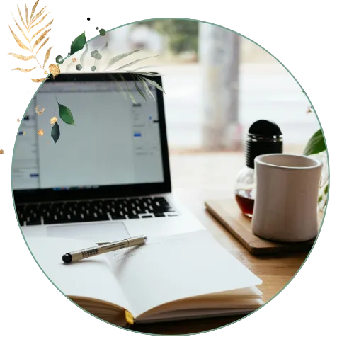 Laptop on desk with coffee mug