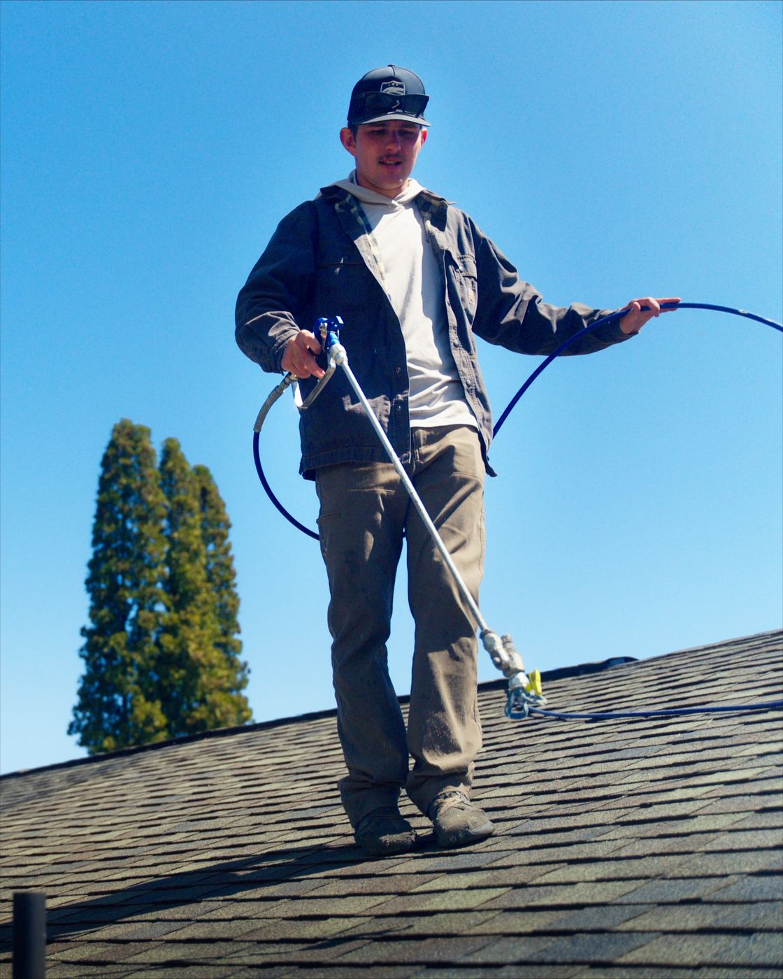 Freedom Shield roof restoration crew on a residential roof