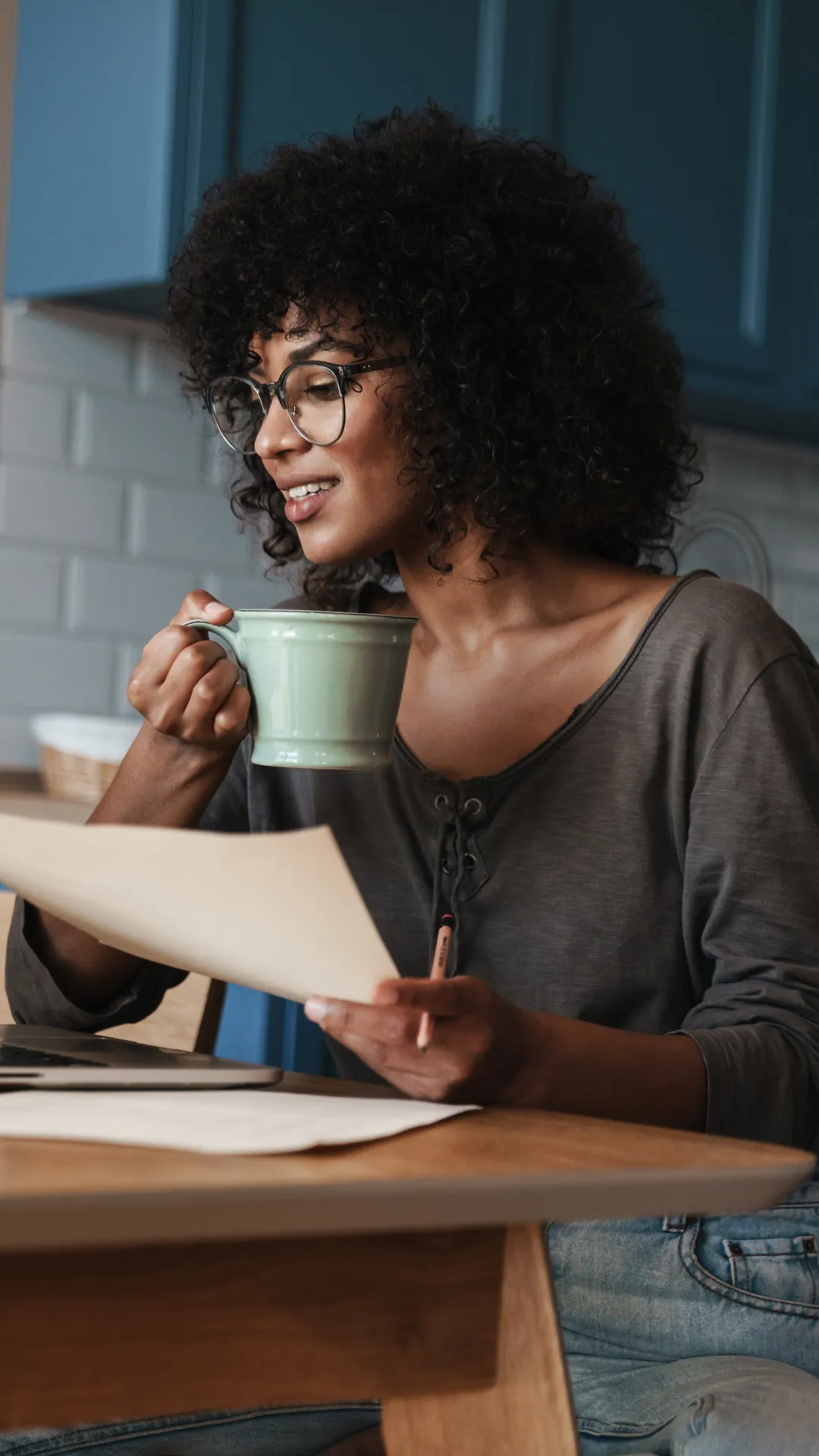 Woman looking at financial papers