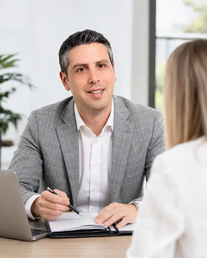 Bryan Litvack helping a client with a debt relief solution