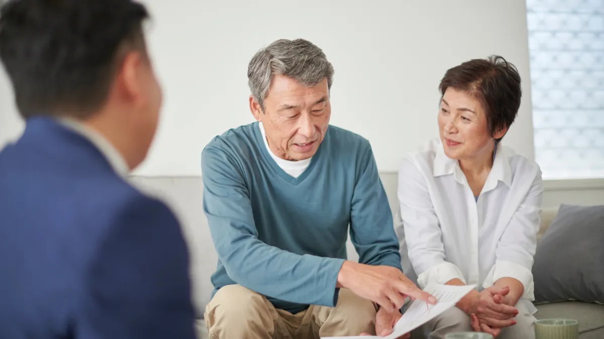 gray concrete cross on gray concrete surface