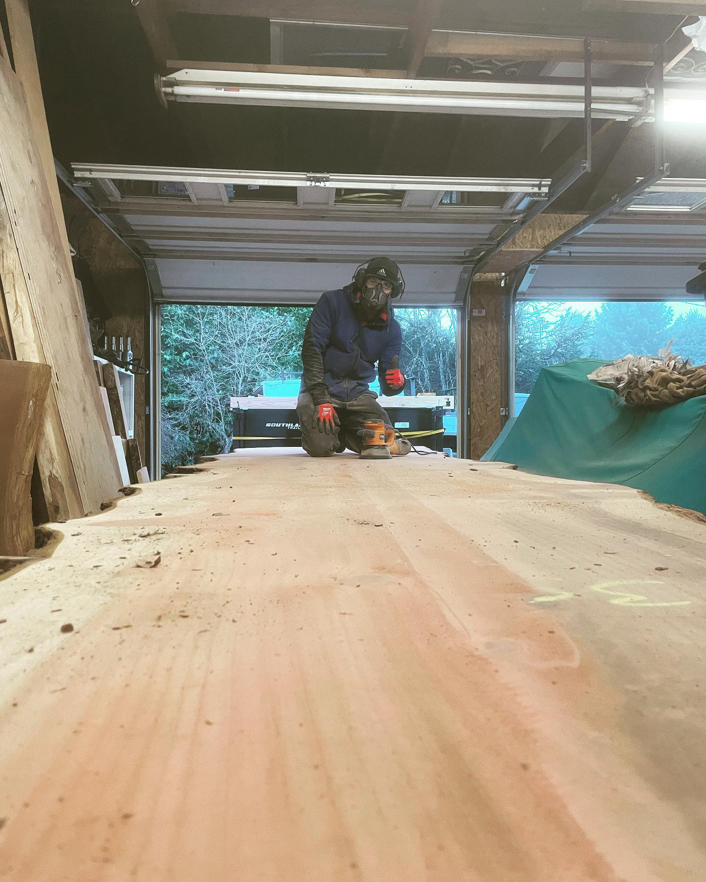 Master craftsman Nick working on a custom timber piece in his local workshop