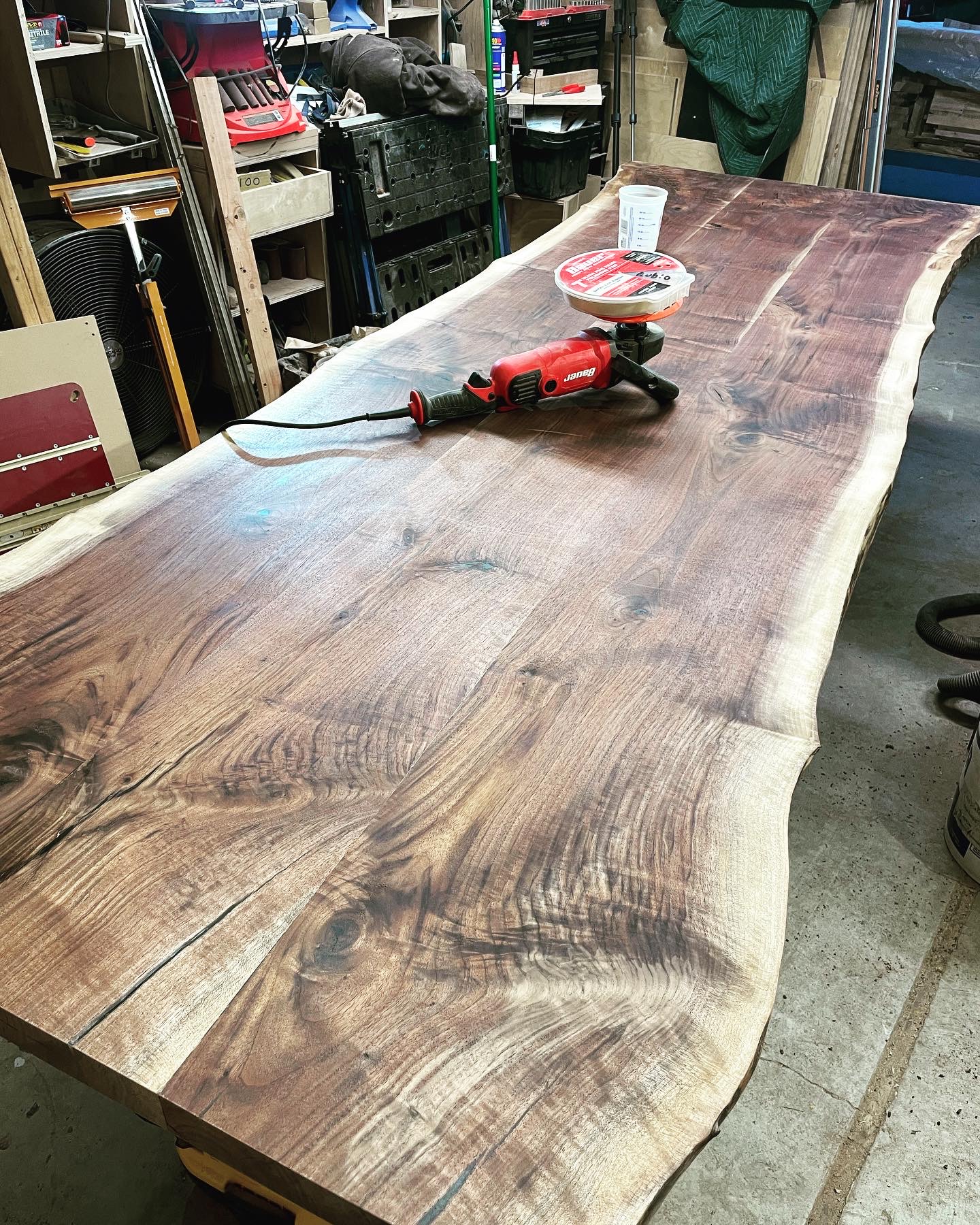 Artisan using precision hand tools to shape custom woodwork