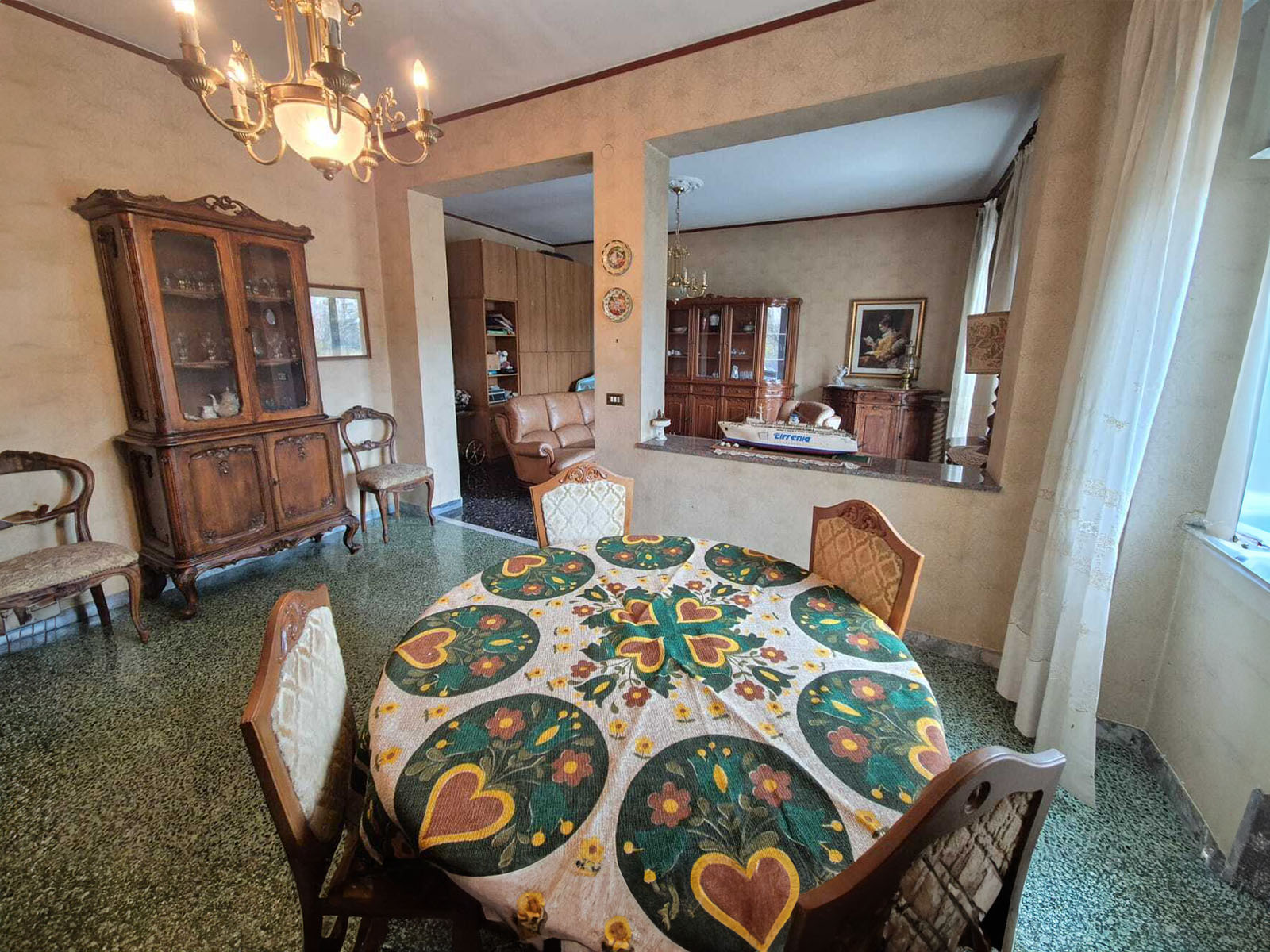 Spa-inspired bathroom featuring a freestanding soaking tub, rain shower, and natural stone finishes, bathed in soft daylight. 3:2 aspect ratio.