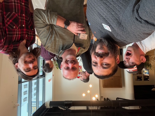 A business professional in Chattanooga sending personalized email campaigns from a laptop, with a visual of reactivating old contacts. The workspace is modern, with warm lighting and a sense of renewed connection.