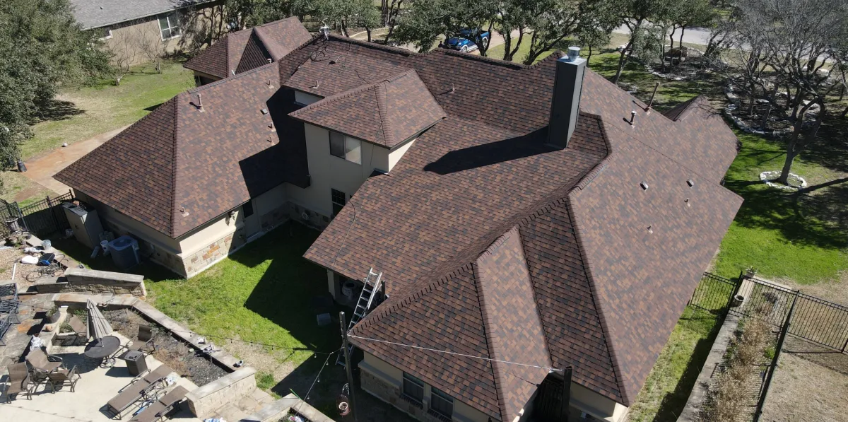 Custom kitchen renovation with new cabinetry, countertops, lighting, and open layout design