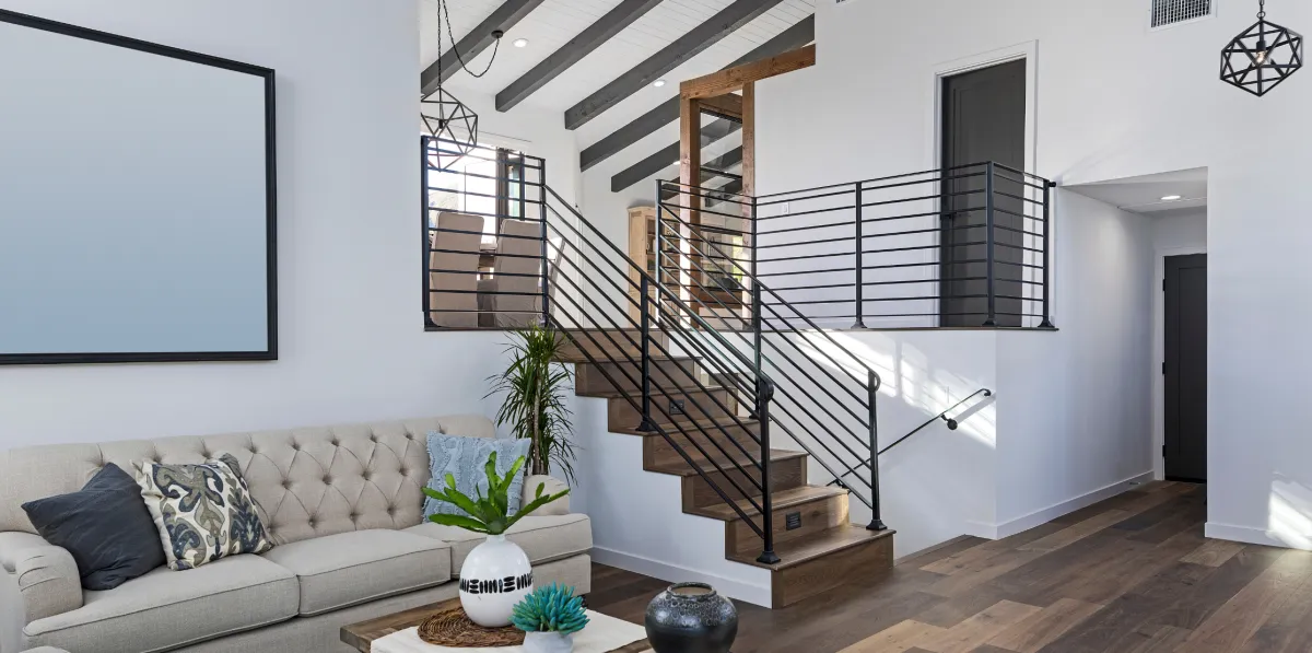 Custom kitchen renovation with new cabinetry, countertops, lighting, and open layout design