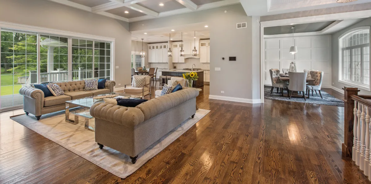 Custom kitchen renovation with new cabinetry, countertops, lighting, and open layout design