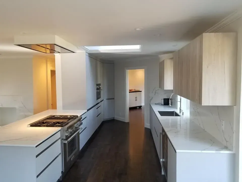 Custom bathroom renovation with tiled walk-in shower and rustic wood vanity with black sink