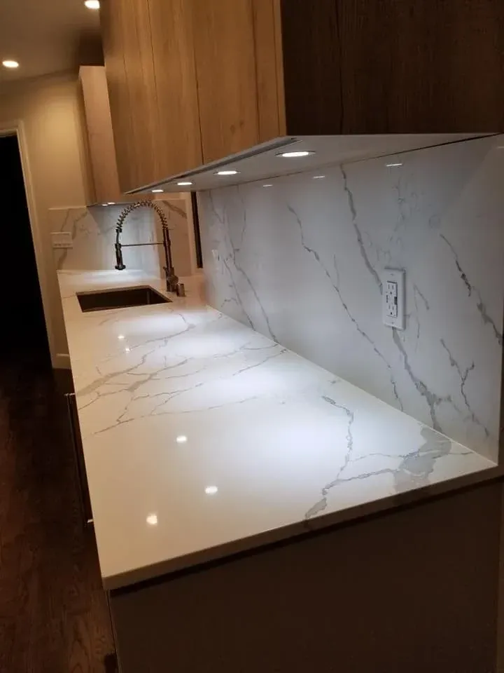 Custom bathroom renovation with tiled walk-in shower and rustic wood vanity with black sink