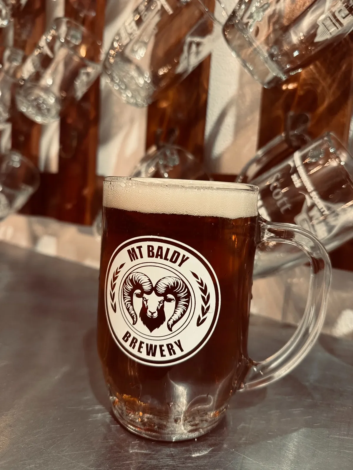 A Mt Baldy Brewery Mug Club mug full of beer