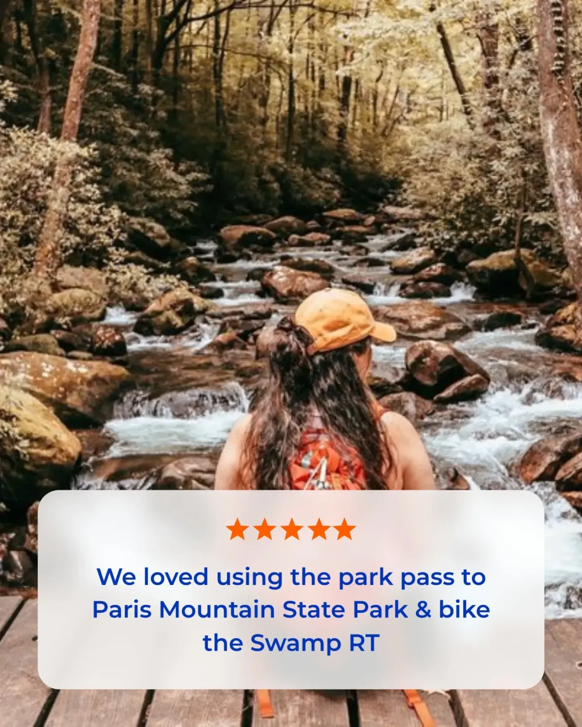 Woman sitting in front of river
