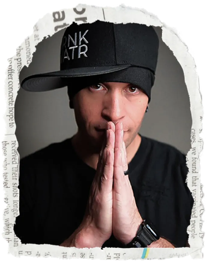 Headshot of a man wearing a black beanie and black shirt, hands clasped, framed with torn paper edges