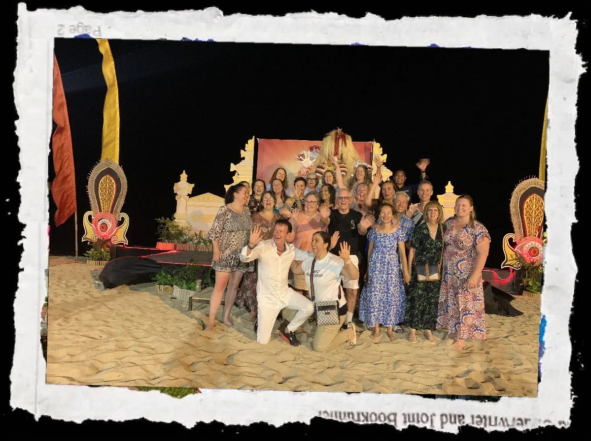 Group of people posing outdoors next to stone ruins under a blue sky, photo with torn paper edges