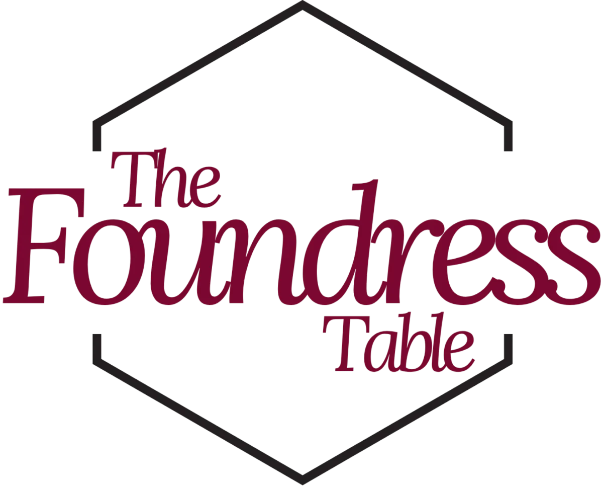 The Foundress Table logo — women’s business mastermind and community helping entrepreneurs build six-figure brands with support and strategy