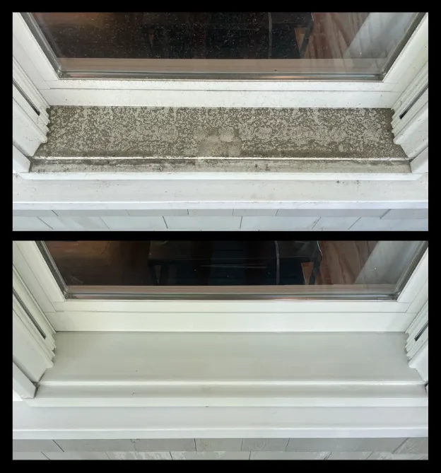 ClearView team cleaning large home windows from the exterior